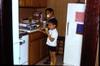 Philip, Marc and ice cream in Hayes kitchen, 1970?