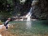 Swimming at a waterfall and pool