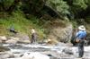 fishermen and couple on opposite bank