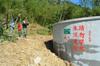 Mr. Chang, Bunon neighbor farmer, Melanie, and Nic.