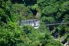 cyclist on the suspension bridge at the head of the FuBa trail 巴福越嶺