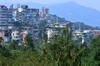 From the path at the base of the steep cliffs across from the community that runs along Lanxi.