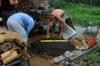 James and Jeremy leveling the raised area before building the spiral