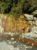 next photo: topping off water at a spring