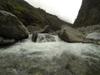 water dropping over landside debris dams