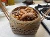 Harvested turmeric roots in a beautiful basket